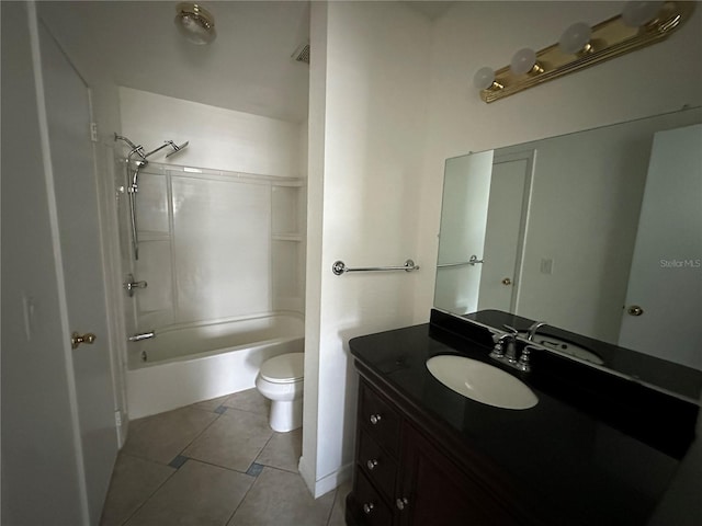 full bathroom with vanity, tile patterned flooring, washtub / shower combination, and toilet