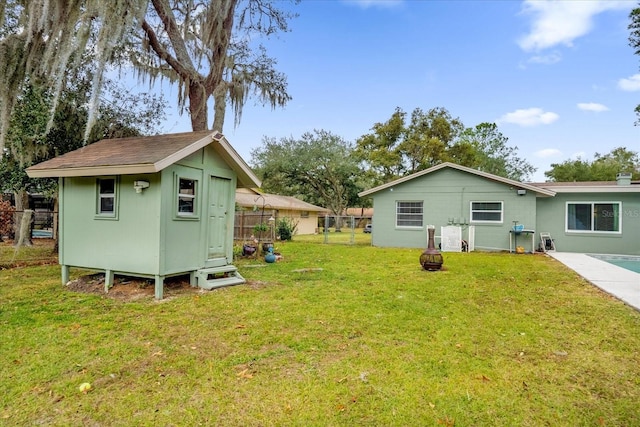 exterior space with a storage shed