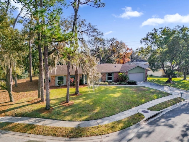 view of front facade with a front lawn and a garage