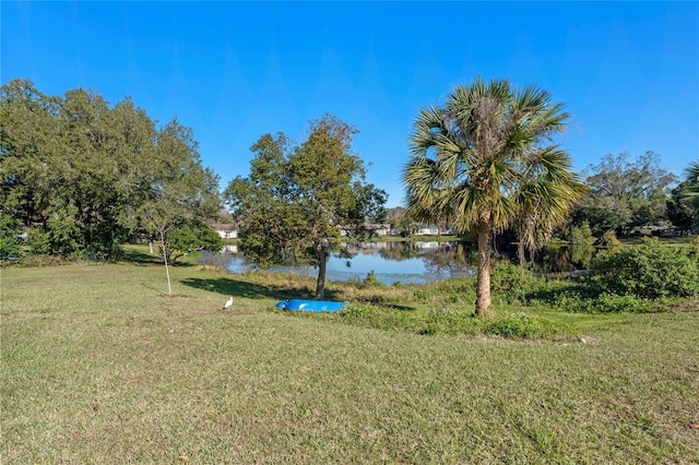 view of yard with a water view