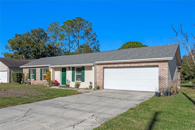 ranch-style house with a garage and a front lawn