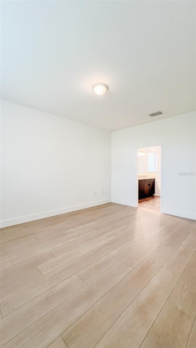 empty room featuring light hardwood / wood-style flooring