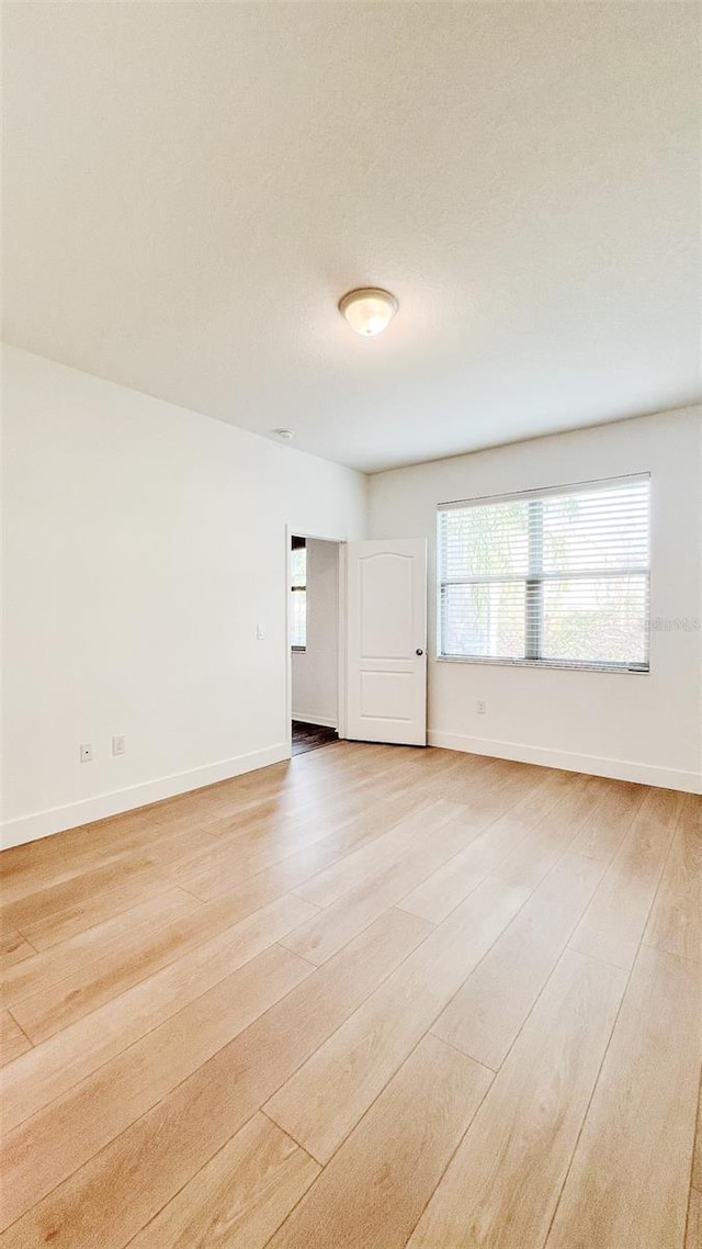 empty room featuring light wood-type flooring