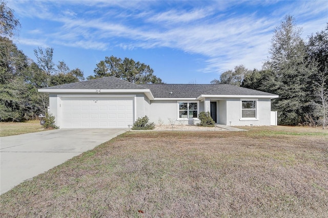 ranch-style home with a garage and a front lawn