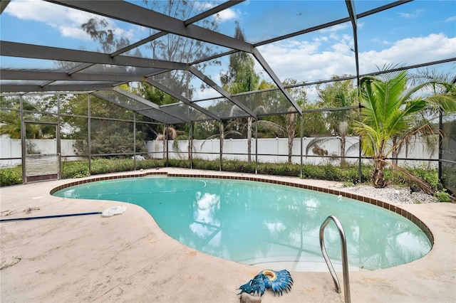 view of pool with a fenced in pool, a lanai, and a fenced backyard