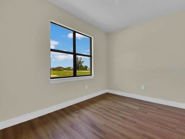 spare room featuring light wood-type flooring