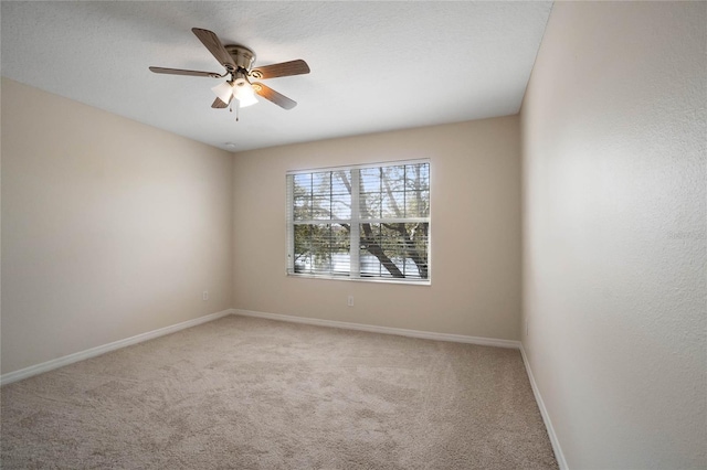 unfurnished room with carpet, a textured ceiling, and ceiling fan