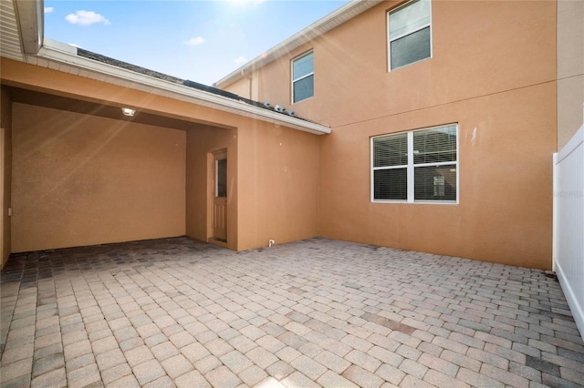 rear view of property with a patio