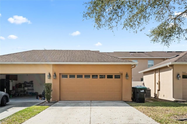 view of front of home with a garage