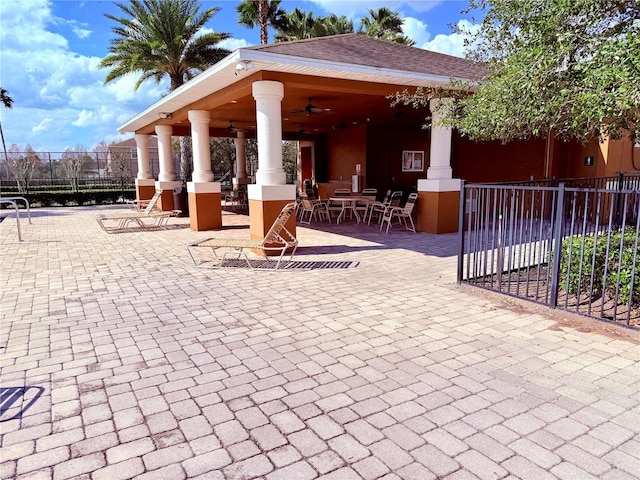 view of home's community with a patio area