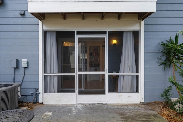 entrance to property with central AC unit