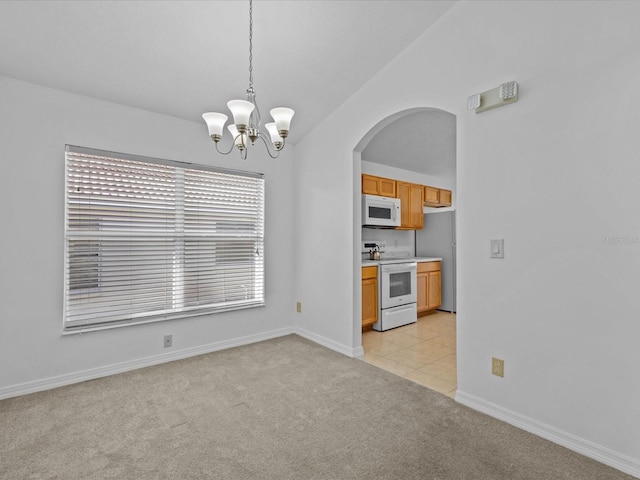 interior space featuring light colored carpet and a notable chandelier