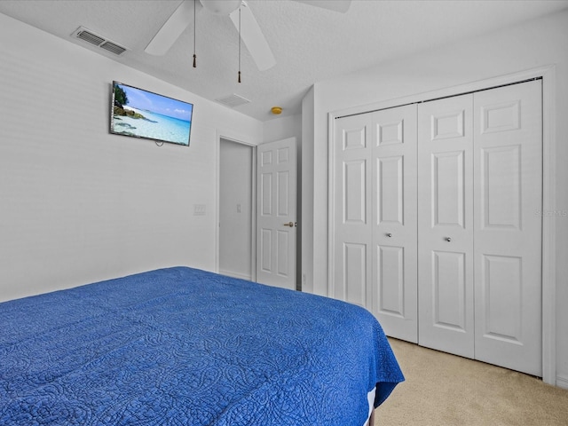 bedroom featuring a closet and ceiling fan