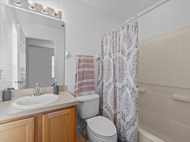 full bathroom featuring toilet, vanity, and shower / bath combo