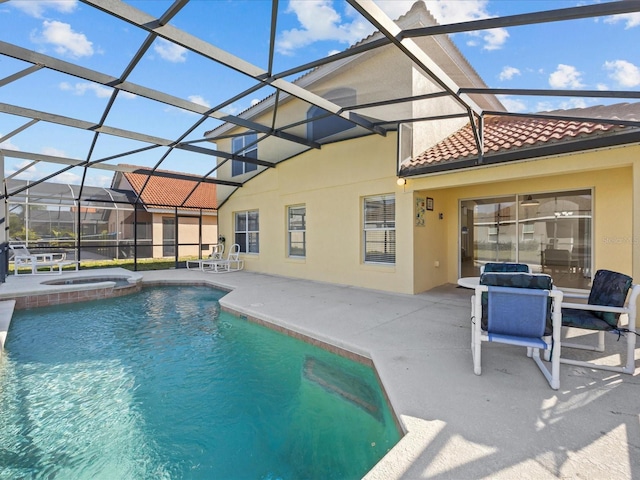 view of swimming pool featuring a lanai, an in ground hot tub, and a patio