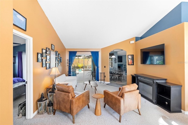 living room with light carpet and lofted ceiling