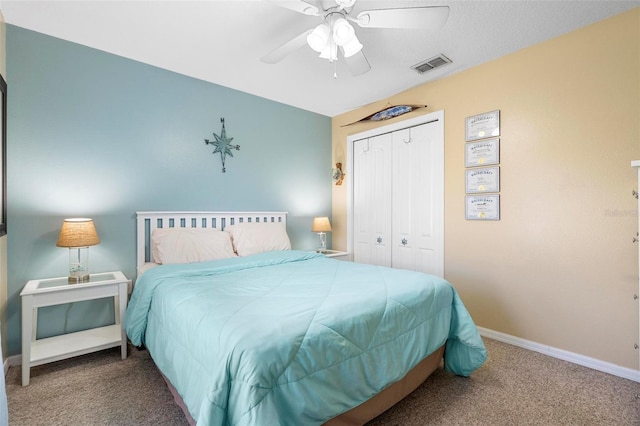 bedroom featuring ceiling fan, a closet, and carpet floors