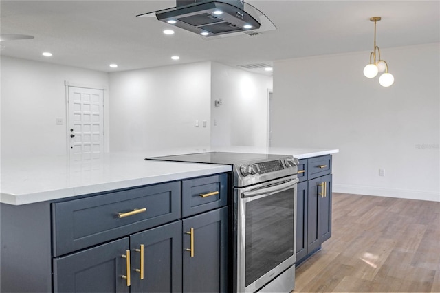 5355 Fay Blvd, Cocoa, FL 32927 - kitchen with decorative light fixtures, light countertops, light wood-type flooring, and stainless steel electric range