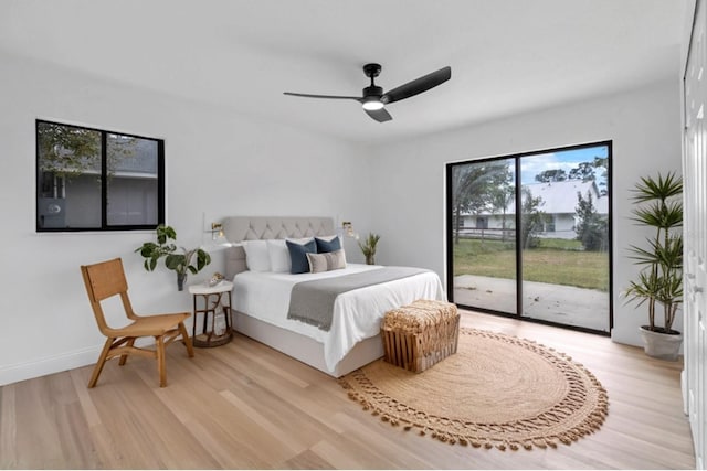 5355 Fay Blvd, Cocoa, FL 32927 - bedroom featuring a ceiling fan, access to exterior, and light wood-style flooring