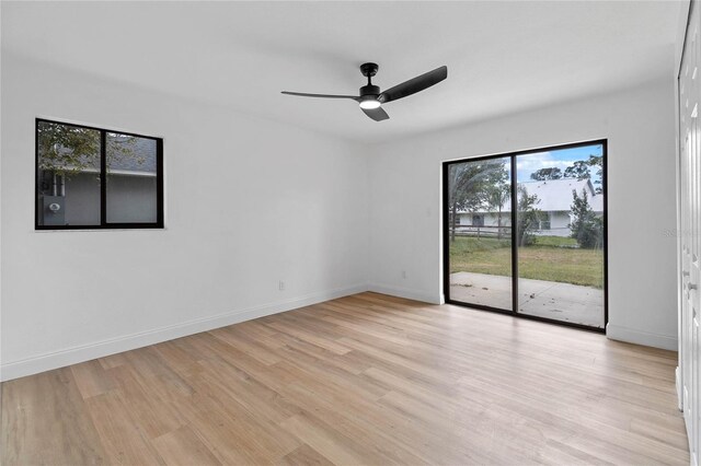 5355 Fay Blvd, Cocoa, FL 32927 - spare room with baseboards, a ceiling fan, and light wood-style flooring