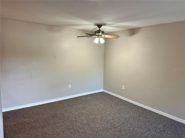 unfurnished room with ceiling fan, carpet, and a textured ceiling