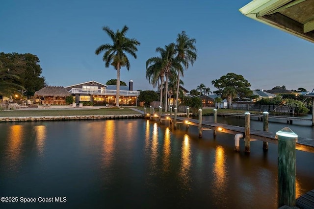 water view featuring a dock