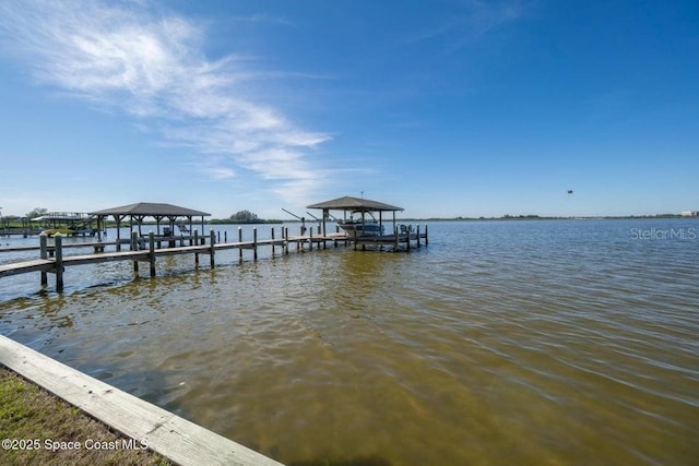 dock area featuring a water view