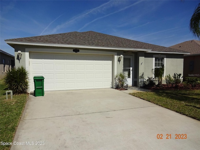 single story home with a garage