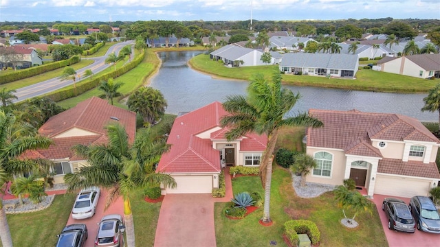 bird's eye view with a water view