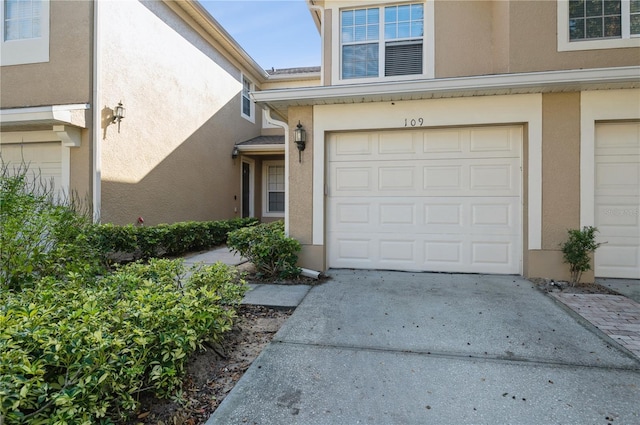 property entrance with a garage