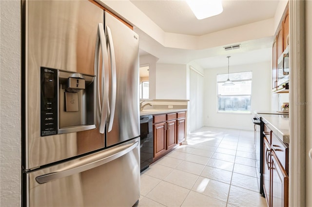 kitchen with range with electric cooktop, hanging light fixtures, black dishwasher, light tile patterned flooring, and stainless steel fridge with ice dispenser