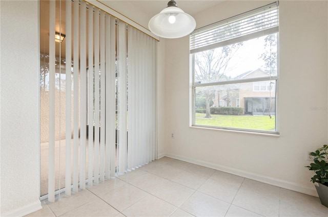 empty room with light tile patterned floors