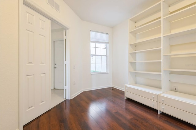 interior space with dark hardwood / wood-style floors