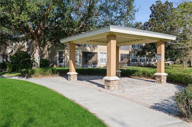 view of home's community featuring a gazebo and a yard