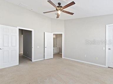 unfurnished bedroom with light carpet and ceiling fan