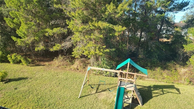 view of play area featuring a lawn