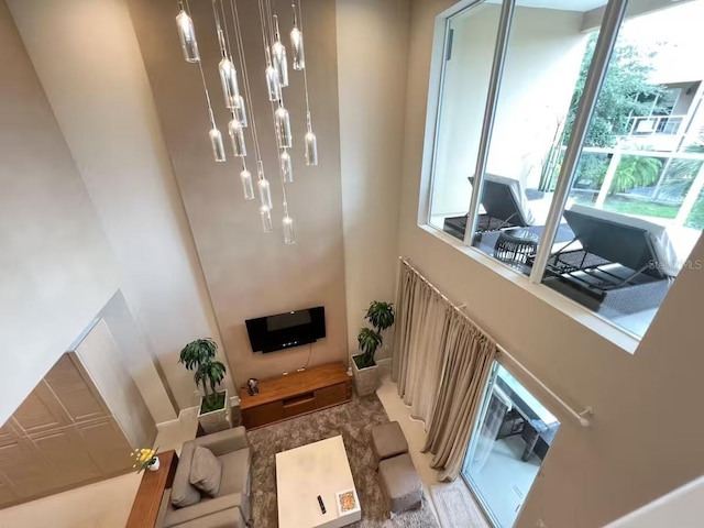 living room featuring a chandelier