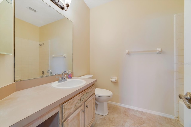 2961 Cedar Glen Pl, Oviedo, FL 32765 - bathroom with vanity, visible vents, toilet, tile patterned floors, and baseboards