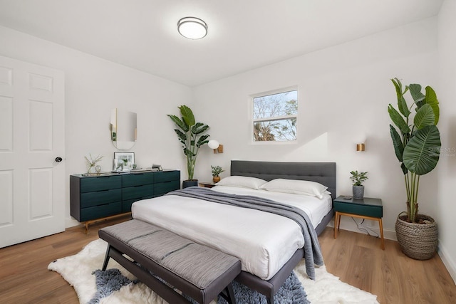 bedroom featuring light wood-type flooring