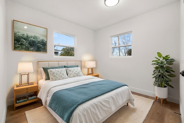 bedroom featuring hardwood / wood-style floors