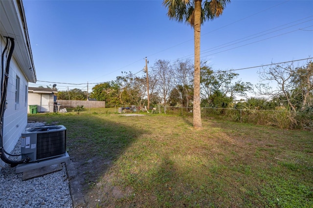 view of yard with central AC