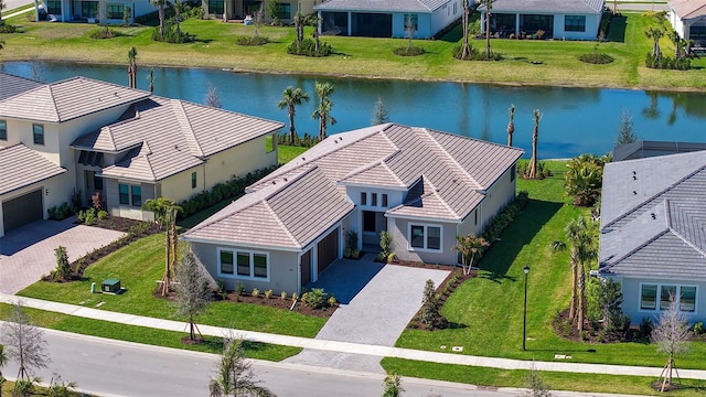 aerial view with a water view and a residential view