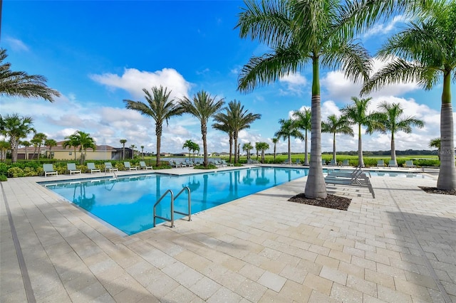 pool with a patio
