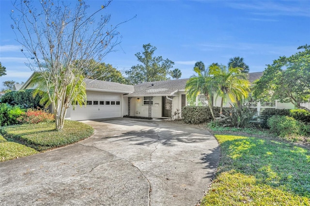 ranch-style house featuring a garage