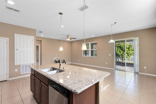 kitchen with dishwasher, ceiling fan, sink, and a kitchen island with sink