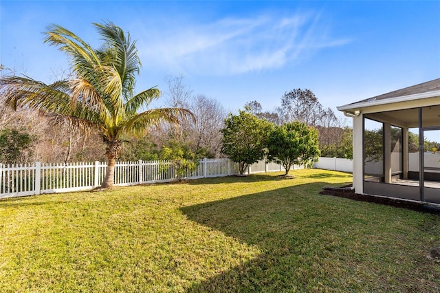 view of yard featuring a sunroom