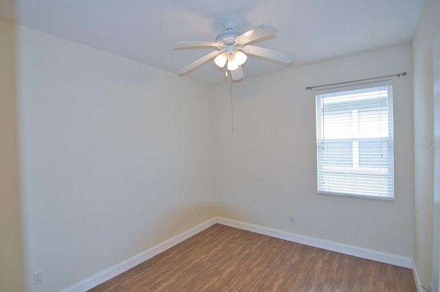 unfurnished room featuring hardwood / wood-style flooring and ceiling fan