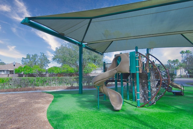 view of play area featuring a lawn