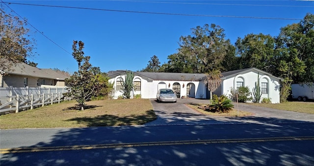 view of front of home with a front lawn