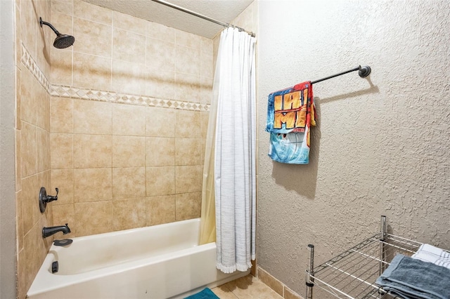 bathroom featuring shower / bathtub combination with curtain